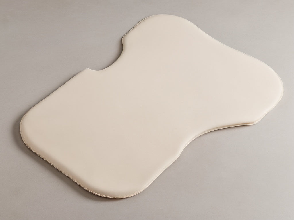 Abdominal compression board and lipo foam sheet arranged with a folded compression garment